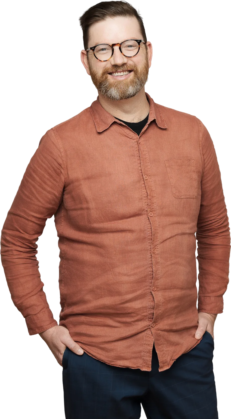 Dan Woods, standing, hands in pockets.